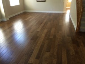 Floor glued down to a concrete slab. Knowing that we applied epoxy moisture barrier first ensured our client a piece of mind. This floor will last a life time. 