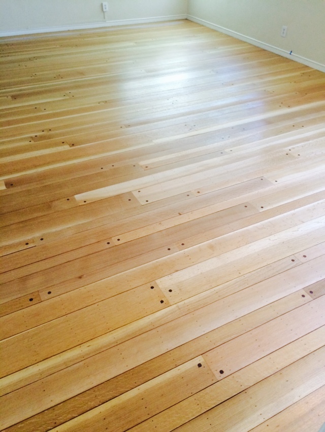 This 80 year old floor was repaired and refinished by Avi's Hardwood Floors